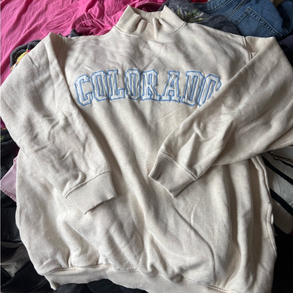 Cream Sweater with Blue Lettering